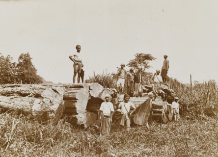 Logging expedition, Burma (Myanmar). Several Burmese lumberjacks pose for the camera beside a