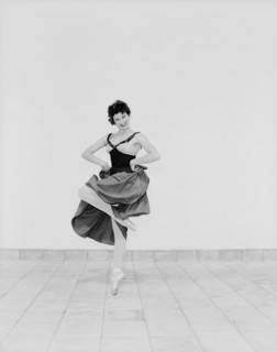 Daphne Dale as Carmen. Dancer Daphne Dale poses for the camera balancing on one toe. Playing the