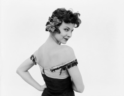 Portrait of Daphne Dale. Dancer Daphne Dale gazes provocatively into the camera. Playing the role