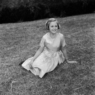 Neville Vincent's daughter. Portrait of Neville Vincent's daughter wearing a satin dress with a