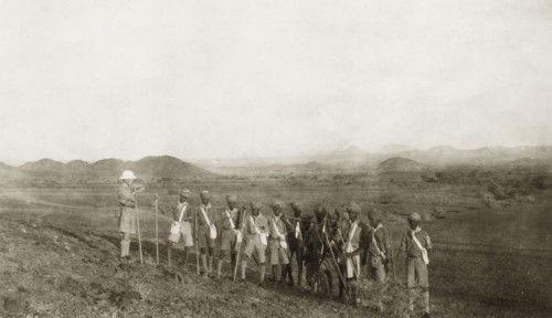 African scout group. A group of African scouts pause during a hike into the country with their