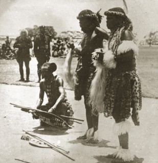 Three Zulu chiefs. Three Zulu chiefs dressed in ceremonial costume made from cheetah fur, gather