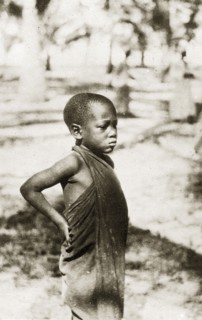 Swahili boy. Portrait of a young Swahili boy standing with his hands on his hips. Zanzibar