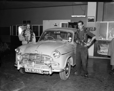 Nairobi to Capetown record run winners. Racing drivers John Manussis and Peter Davies pose beside a