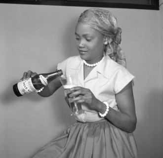 Promotional shot for Allsopp's Pale Ale. Promotional shot for Allsopp's Pale Ale. A smiling African