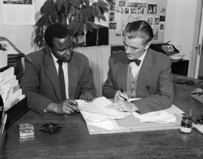 Authors work on a book. Promotional shot for the East African Literature Bureau. Two authors