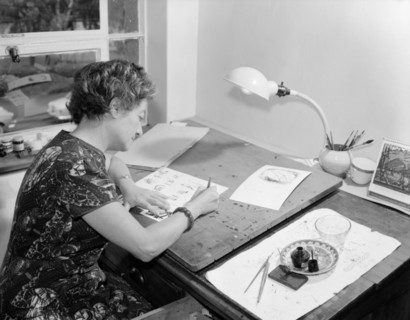 A book artist at work. Promotional shot for the East African Literature Bureau. An artist finishes