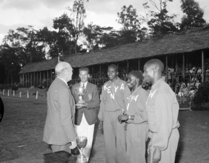 The Kenyan Olympic team at the Royal Show. Onlookers in a spectator stand at the Royal show watch