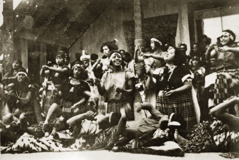 Maori dancers. A group of Maori women perform a lively dance dressed in their traditional costume