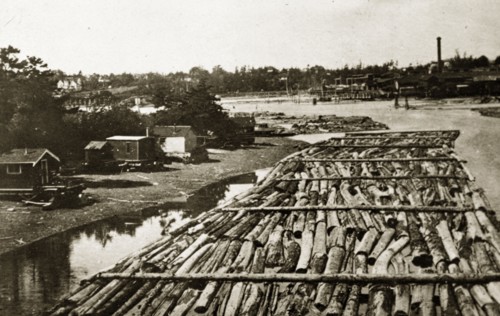 Canadian boomlogging. Logs contained by booms float on a Canadian river. British Colombia, Canada,