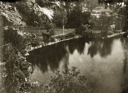 Lake at Butchart gardens. View of a lake and landscaped scenery at Butchart gardens. Victoria,