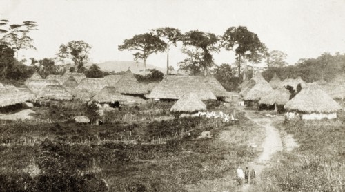Panguma, Sierra Leone. A village scene depicting traditional thatched roof huts. Panguma, Sierra