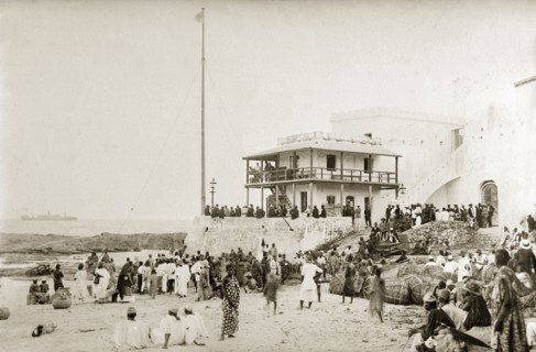 Cape Coast and SS Karina. View of an official building, possibly a customs house, at Cape Coast.