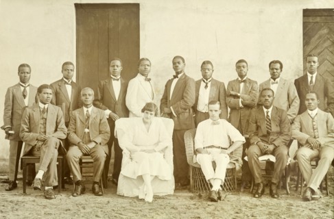 Alfred Tamlin and Miller Brothers staff. Formal group portrait of Alfred Tamlin and his wife
