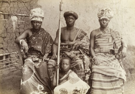 The Mensa of Kumasi and his family. Outdoors portrait of the Mensa of Kumasi with his two wives and