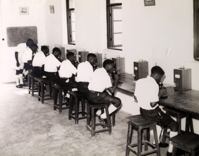 Tanganyikan students with microscopes. Official publicity shot for the Tanganyikan government. A