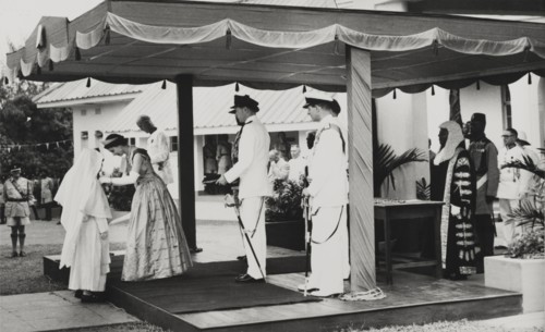 Queen Elizabeth II confers an Honorary OBE. Queen Elizabeth II confers an Honorary OBE to Reverend