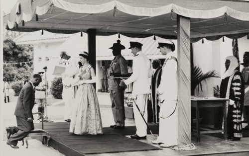 Queen Elizabeth II confers a knighthood. Queen Elizabeth II confers a knighthood on Dr Francis