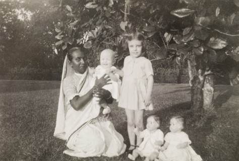 Ayah with children. An Indian ayah (nursemaid) poses beside her British charges, a young girl and a