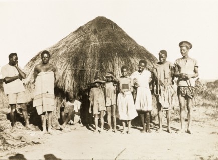 African workers and children at Balloch Farm. Portrait of a group of male African farm workers and