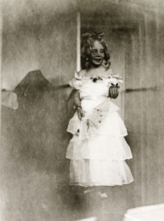 Girl in fancy dress aboard RMS Arundel Castle. Portrait of a young girl dressed in costume for a
