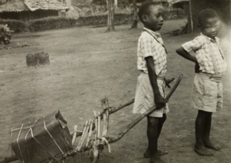 Boys at Mombasa Intermediate School. Two young boys in uniform play outside Mombasa Intermediate