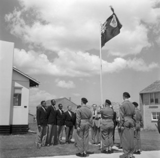 The 1956 Ugandan Olympic team. Athletes from the 1956 Ugandan Olympic team stand in line with