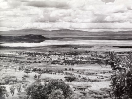 View of Lake Nakuru, Kenya. Panoramic view over rolling scrubland looking towards Lake Nakuru,