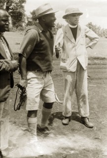 Pro-government Kikuyu and a Catholic priest. A loyal Kikuyu chief talks to a Roman Catholic priest