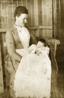 Mrs Robertson and Molly Harr'. A woman identified as 'Mrs Robertson' looks down at 'Molly Harr', a