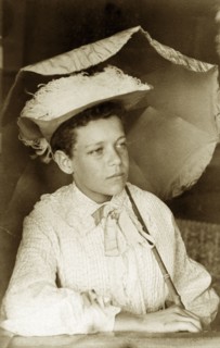 Portrait of 'Goosey', Australia. Amateur portrait of, Evan ('Goosey') Pughe, dressed up as a woman.