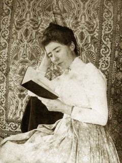 Portrait of a Victorian lady, Australia. Portrait of a Victorian lady reading from a book against a