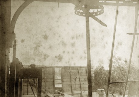Destruction of a temporary church. View from inside the ruins of a wooden church constructed on a