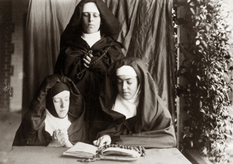 Dressed up as nuns, Australia. Prunella ('Prue') Brodribb, pictured right, and two friends pose for