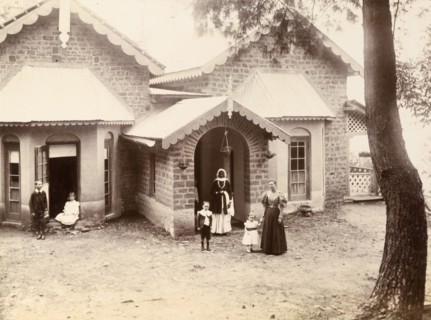 Lieutenant Maslin's bungalow. Supervised by their mother and a finely dressed Indian woman, a