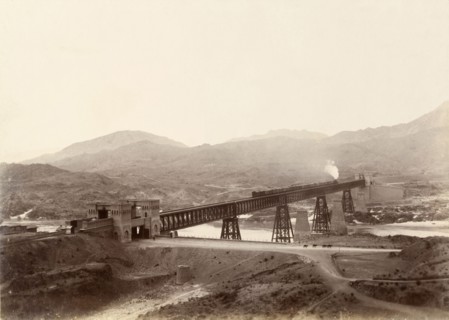 Iron girder bridge at Attock. A freight train crosses the iron girder bridge at Attock over the