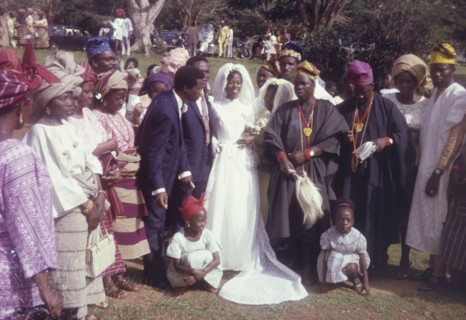 Sayo Bewaji's wedding'. Originally captioned as 'Sayo Bewaji's wedding', a bride and groom pose for