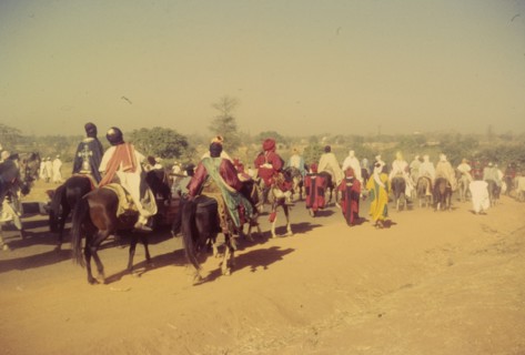 Procession for Ramadan. A procession held to celebrate the end of Ramadan heads into the distance