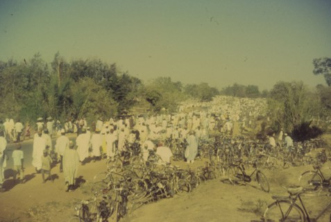 Procession for Ramadan. A procession held to celebrate the end of Ramadan heads into the distance