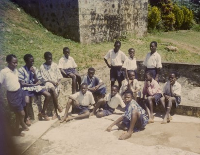 Church of Nigeria schoolboys. Uniformed boys from a Church of Nigeria school relax outdoors on a