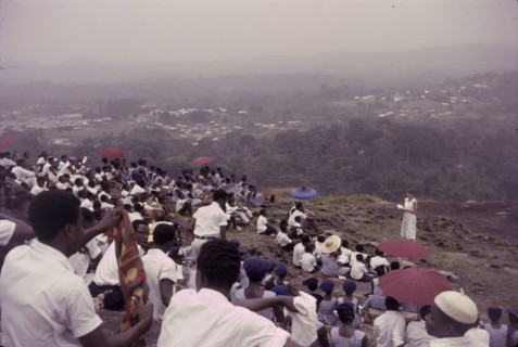 Student union picnic, Nigeria. Uniformed students from a Church of Nigeria college sit on a