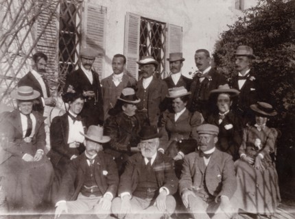 A British group in Morocco. A group of British men and women dressed in their best attire, line up