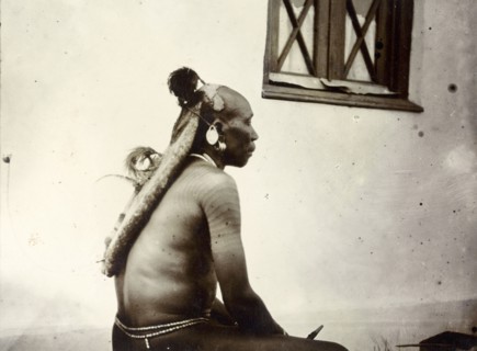 Turkana man's hairstyle. Profile shot showing the hairstyle of a Turkana man, daubed in traditional