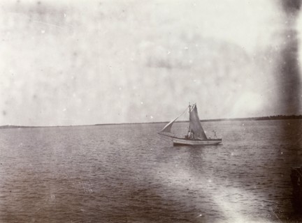 Mail boat on Lake Victoria. A small mail boat sails of the coast of Lake Victoria. Lake Victoria,