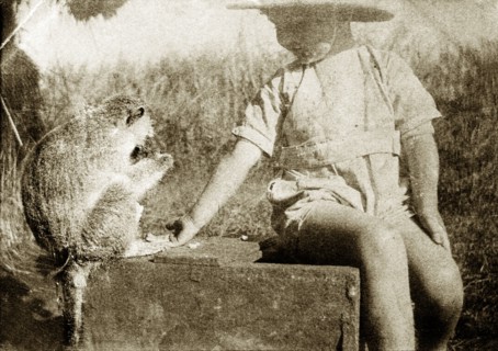 Charlie Trotter feeds Marmaduke. A thoughtful Charles Trotter, aged around five years old, sports a