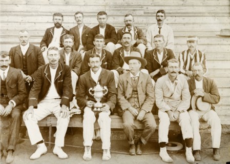 Premier Diamond Mine cricket team. Cricket team of the Premier Diamond Mine. The man in the striped