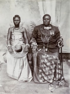 Studio portrait of Dogho Numa and his wife. Studio portrait of Dogho Numa and his wife dressed in