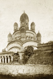 The Dakshineshwar Temple. The Dakshineshwar temple at Kali Ghat, adorned with nine 'chhatris'