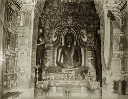 Statue of Budda. Interior of a Buddhist temple and associated Budda statue. Ceylon (Sri Lanka),