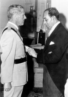 Leslie Slater receives his OBE. Sir Deighton Lisle Ward, the Governor General of Barbados between